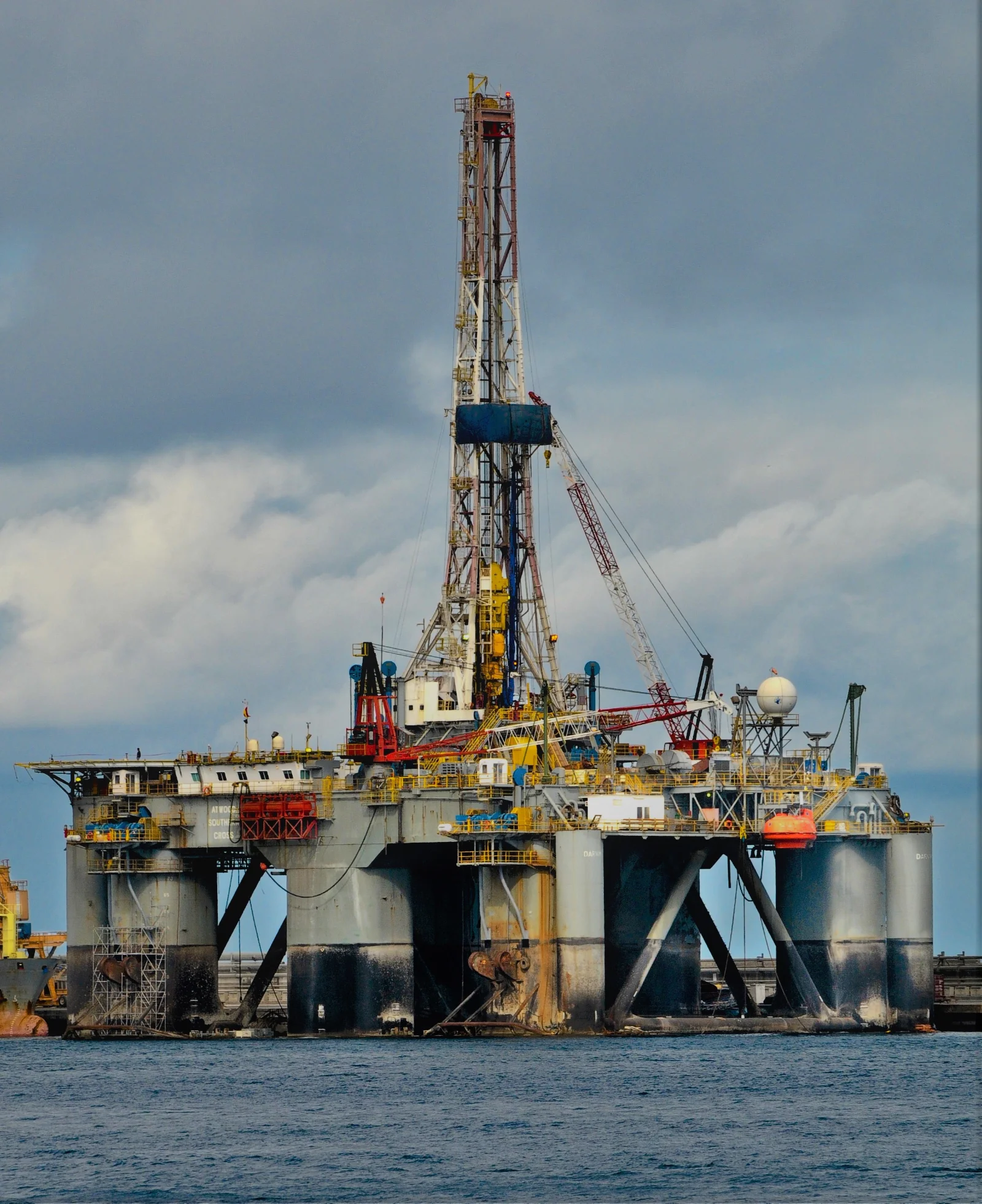 A semisubmersible mobile offshore drilling unit, a MODU, moored inshore